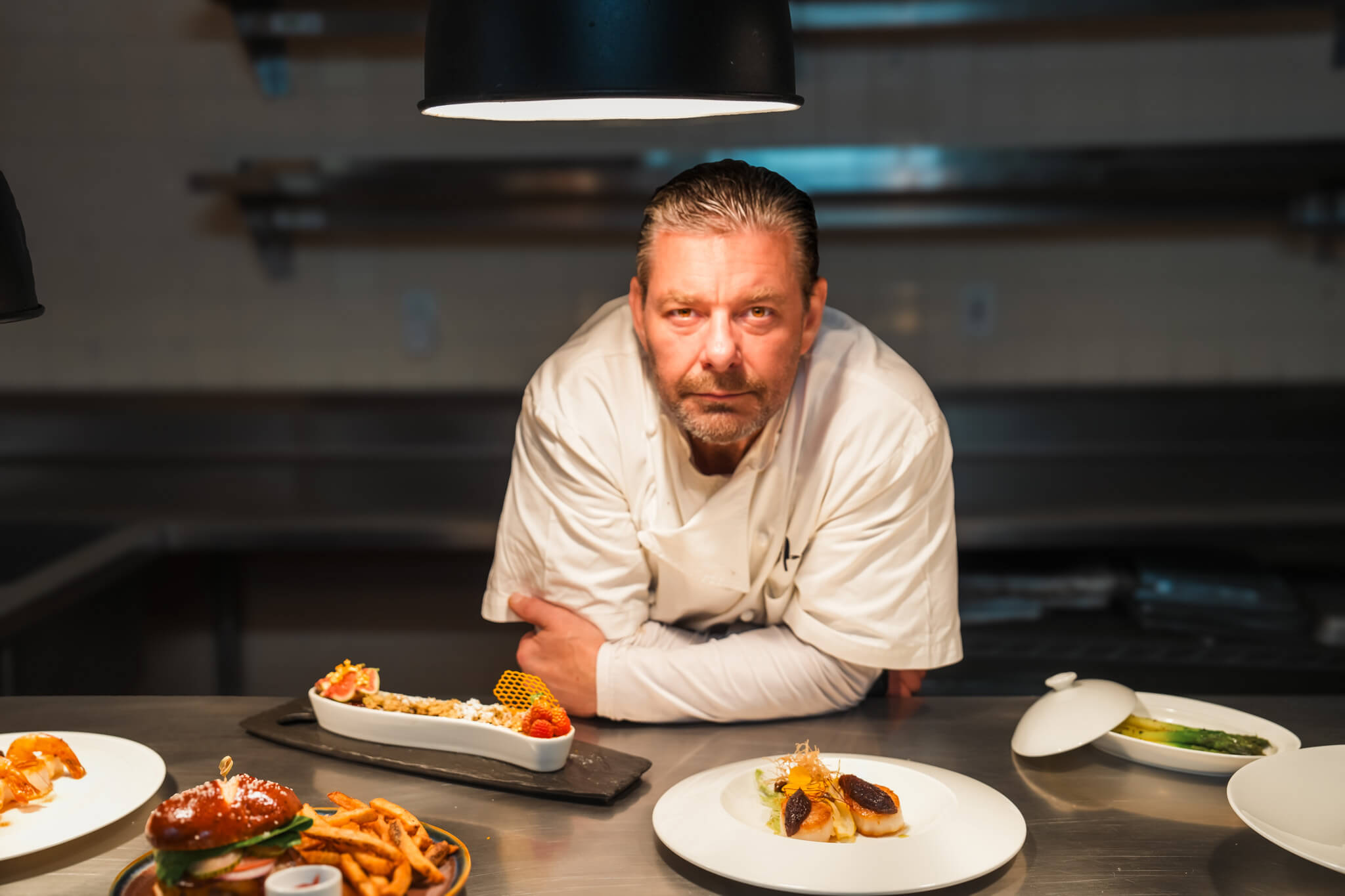 Chef Paul Syms portrait showcasing culinary expertise and passion